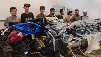 توزيع الملابس